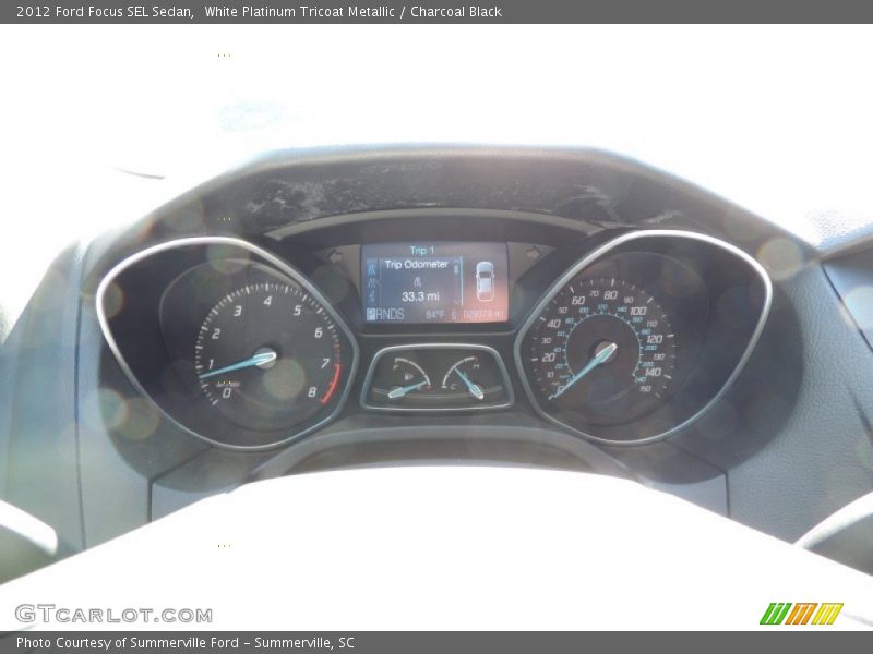 White Platinum Tricoat Metallic / Charcoal Black 2012 Ford Focus SEL Sedan