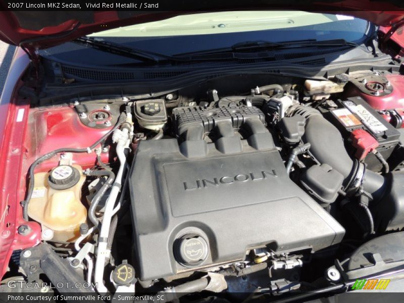 Vivid Red Metallic / Sand 2007 Lincoln MKZ Sedan