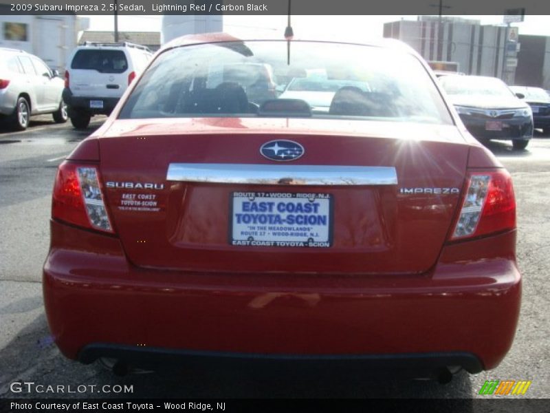 Lightning Red / Carbon Black 2009 Subaru Impreza 2.5i Sedan