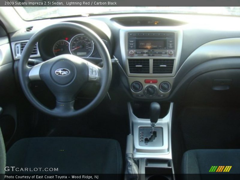 Lightning Red / Carbon Black 2009 Subaru Impreza 2.5i Sedan