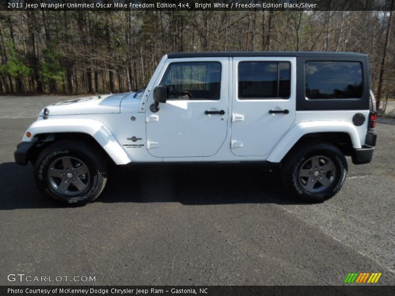 Bright White / Freedom Edition Black/Silver 2013 Jeep Wrangler Unlimited Oscar Mike Freedom Edition 4x4