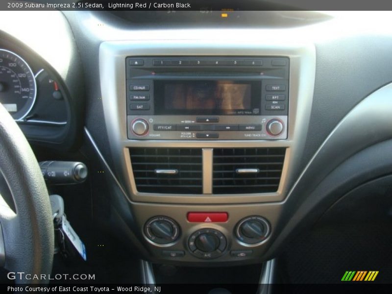 Lightning Red / Carbon Black 2009 Subaru Impreza 2.5i Sedan