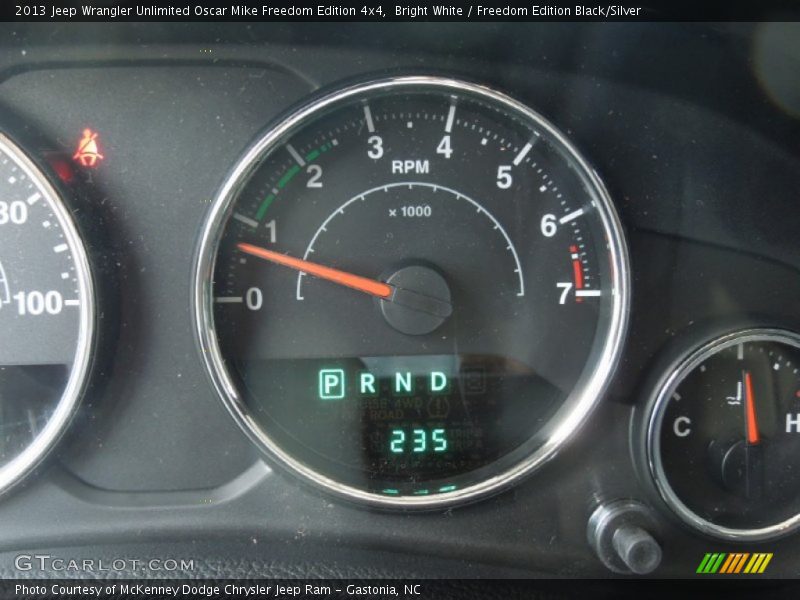 Bright White / Freedom Edition Black/Silver 2013 Jeep Wrangler Unlimited Oscar Mike Freedom Edition 4x4