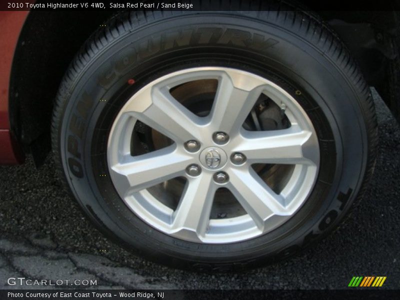Salsa Red Pearl / Sand Beige 2010 Toyota Highlander V6 4WD