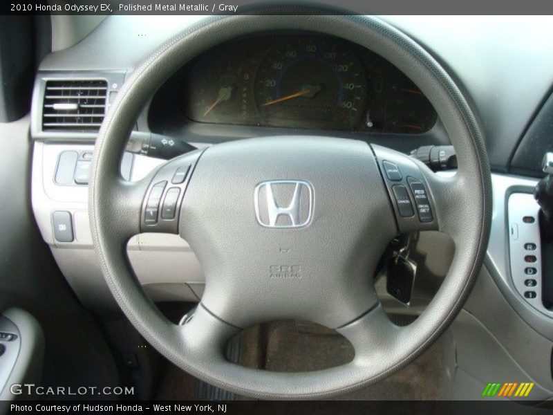 Polished Metal Metallic / Gray 2010 Honda Odyssey EX