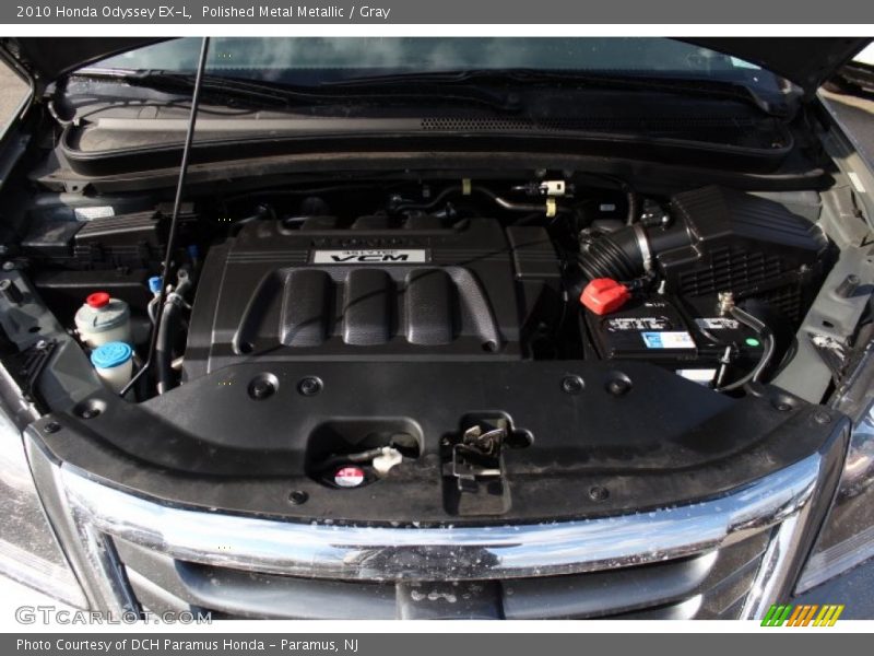 Polished Metal Metallic / Gray 2010 Honda Odyssey EX-L