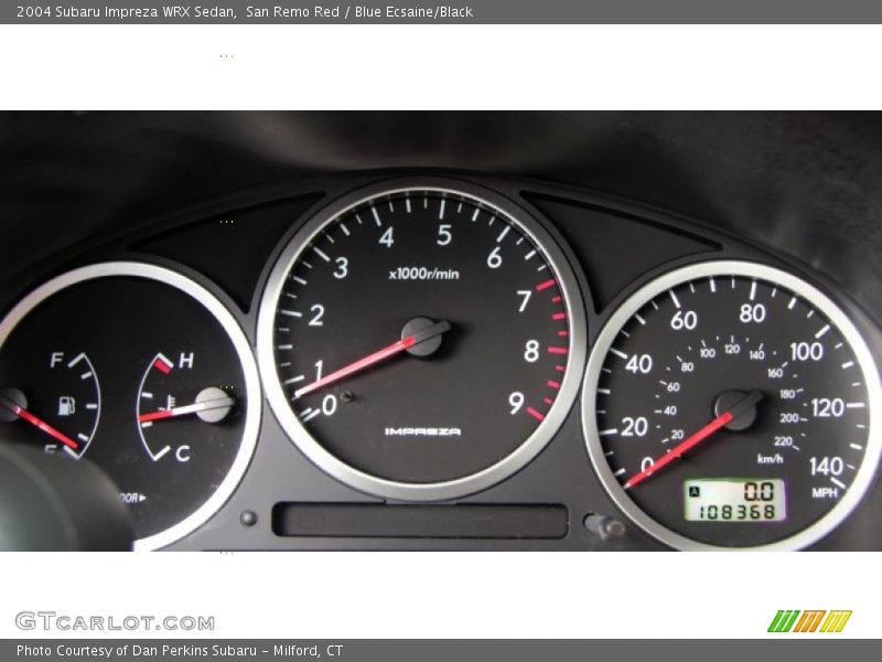 San Remo Red / Blue Ecsaine/Black 2004 Subaru Impreza WRX Sedan