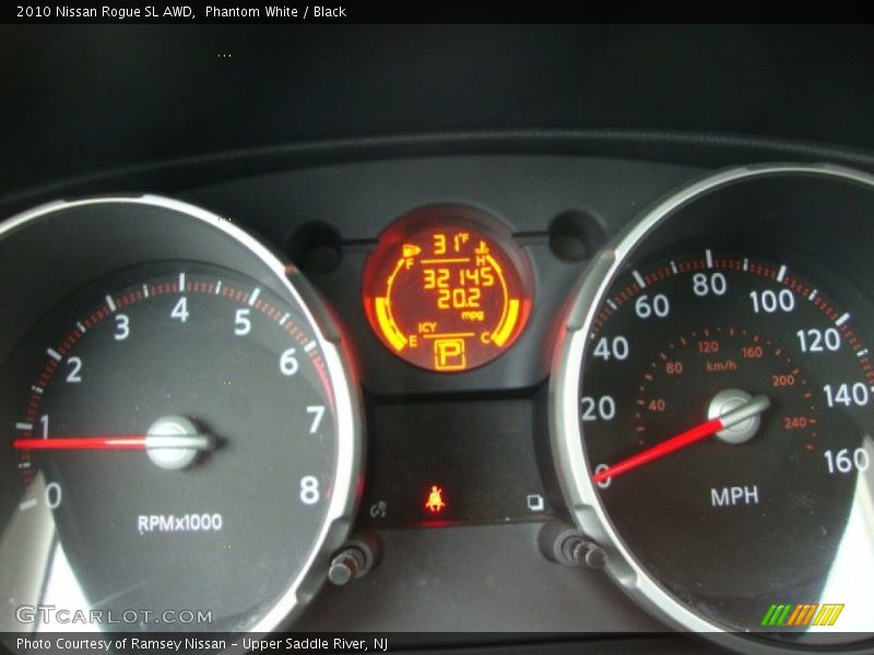 Phantom White / Black 2010 Nissan Rogue SL AWD