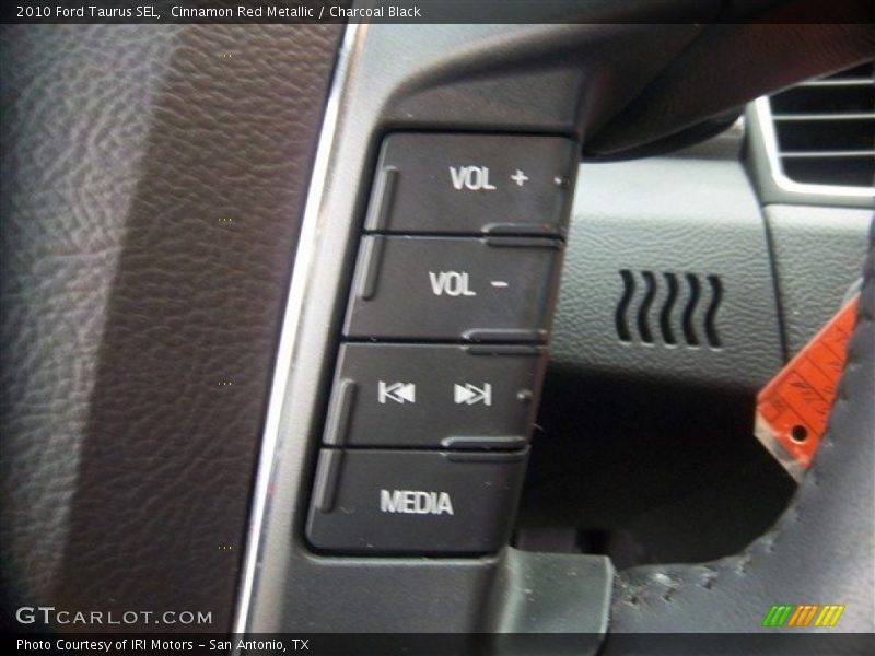 Cinnamon Red Metallic / Charcoal Black 2010 Ford Taurus SEL