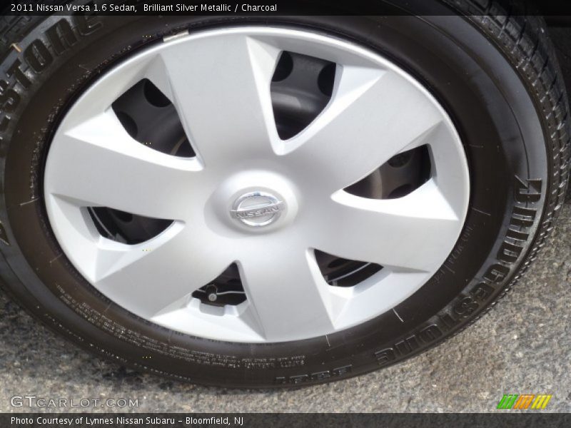 Brilliant Silver Metallic / Charcoal 2011 Nissan Versa 1.6 Sedan
