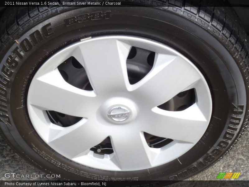 Brilliant Silver Metallic / Charcoal 2011 Nissan Versa 1.6 Sedan