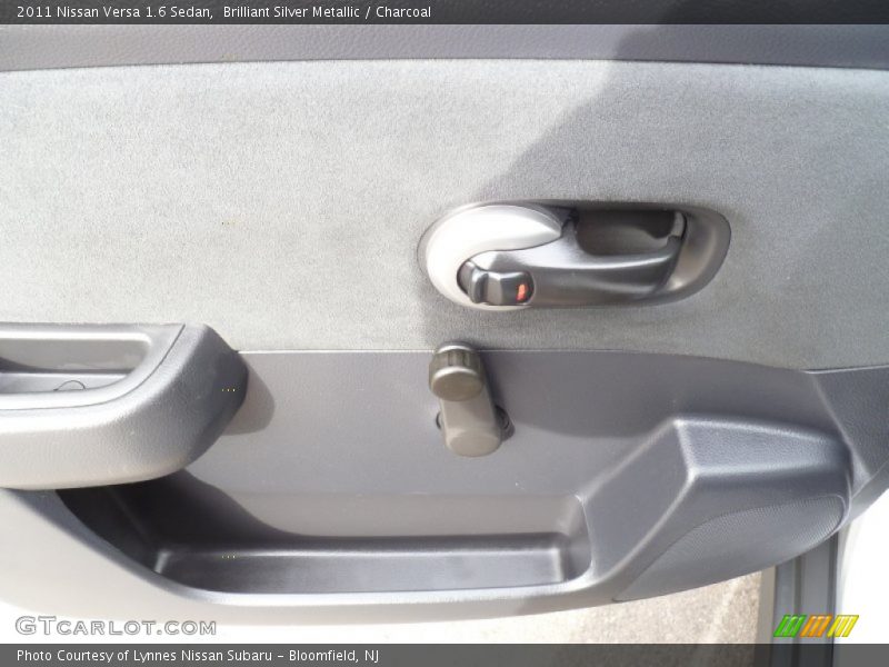 Brilliant Silver Metallic / Charcoal 2011 Nissan Versa 1.6 Sedan