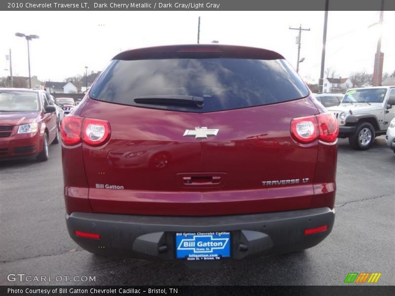 Dark Cherry Metallic / Dark Gray/Light Gray 2010 Chevrolet Traverse LT