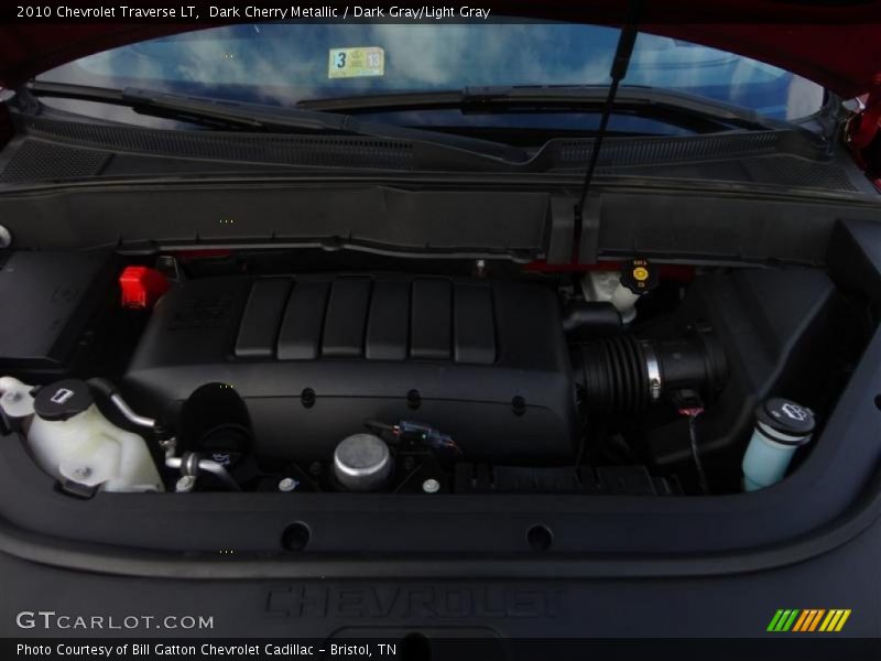 Dark Cherry Metallic / Dark Gray/Light Gray 2010 Chevrolet Traverse LT