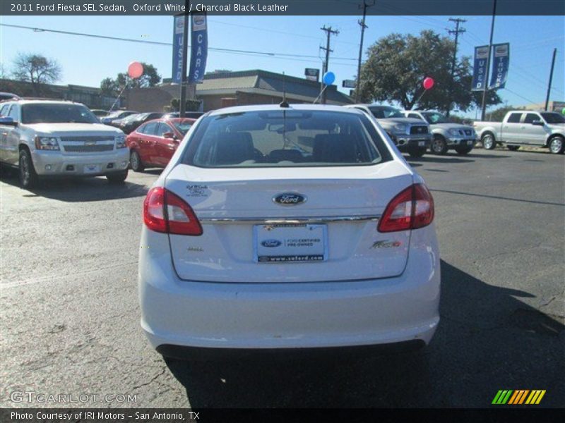 Oxford White / Charcoal Black Leather 2011 Ford Fiesta SEL Sedan
