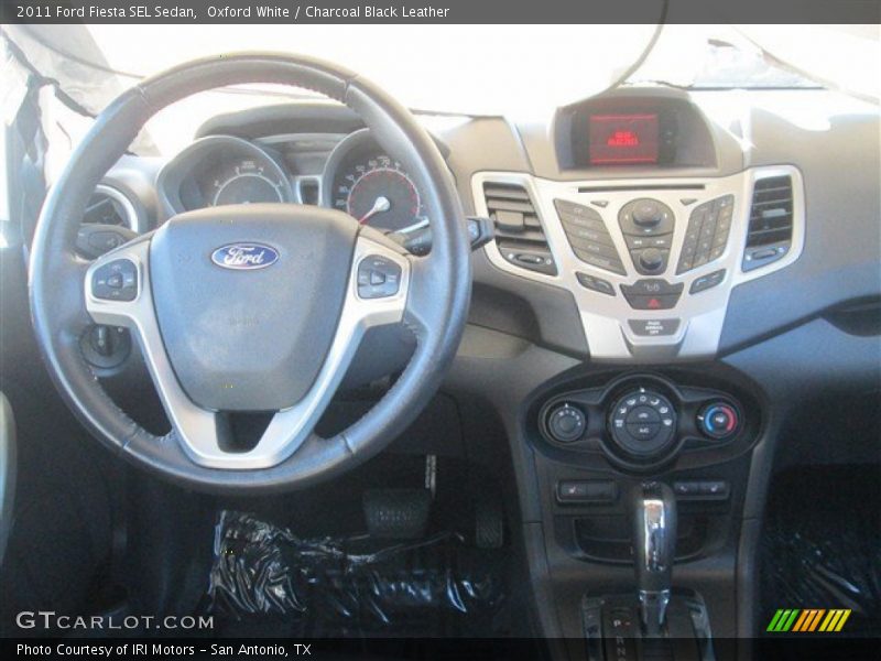 Oxford White / Charcoal Black Leather 2011 Ford Fiesta SEL Sedan