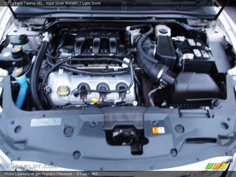 Ingot Silver Metallic / Light Stone 2010 Ford Taurus SEL