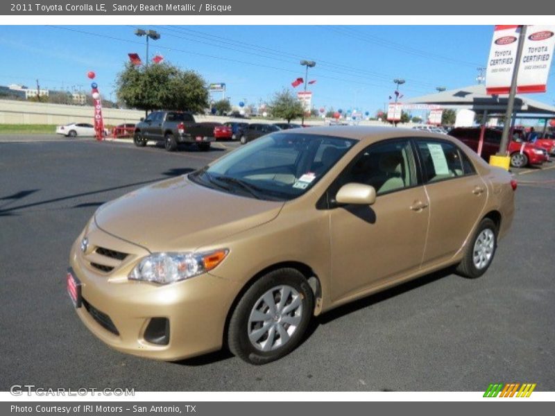 Sandy Beach Metallic / Bisque 2011 Toyota Corolla LE