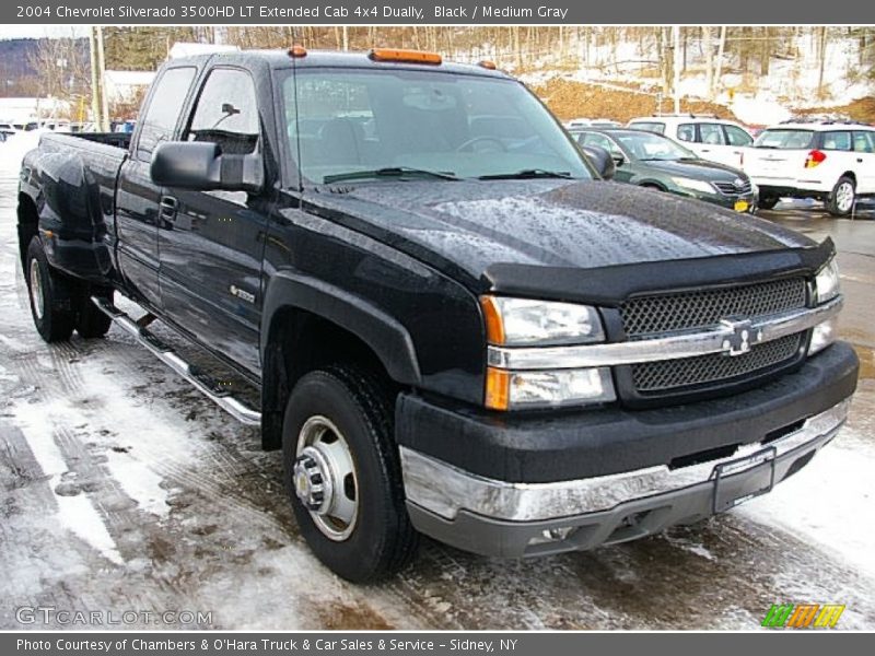 Front 3/4 View of 2004 Silverado 3500HD LT Extended Cab 4x4 Dually
