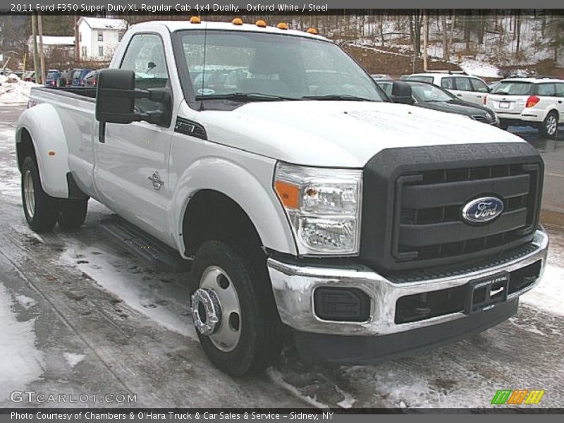 Front 3/4 View of 2011 F350 Super Duty XL Regular Cab 4x4 Dually