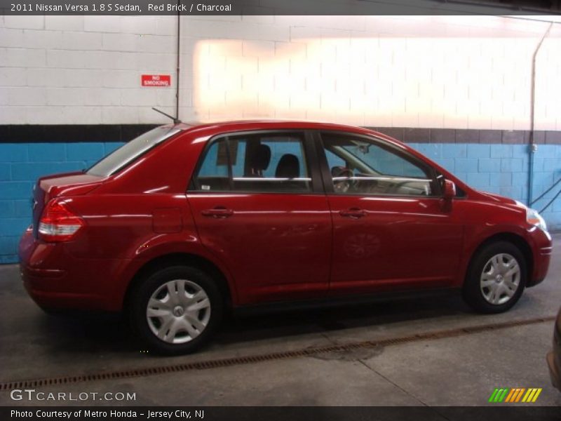 Red Brick / Charcoal 2011 Nissan Versa 1.8 S Sedan