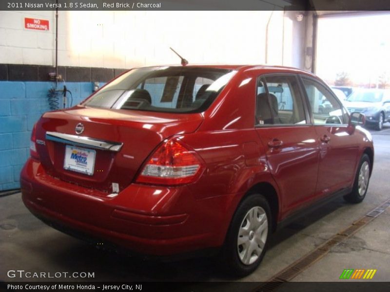 Red Brick / Charcoal 2011 Nissan Versa 1.8 S Sedan