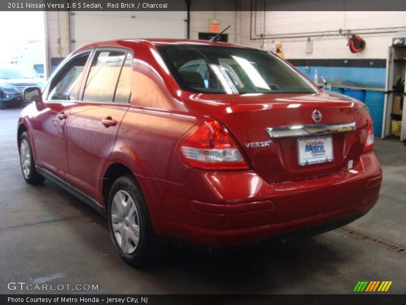 Red Brick / Charcoal 2011 Nissan Versa 1.8 S Sedan