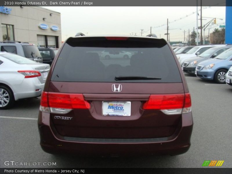 Dark Cherry Pearl / Beige 2010 Honda Odyssey EX