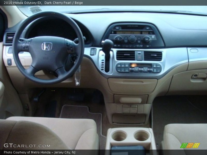 Dark Cherry Pearl / Beige 2010 Honda Odyssey EX