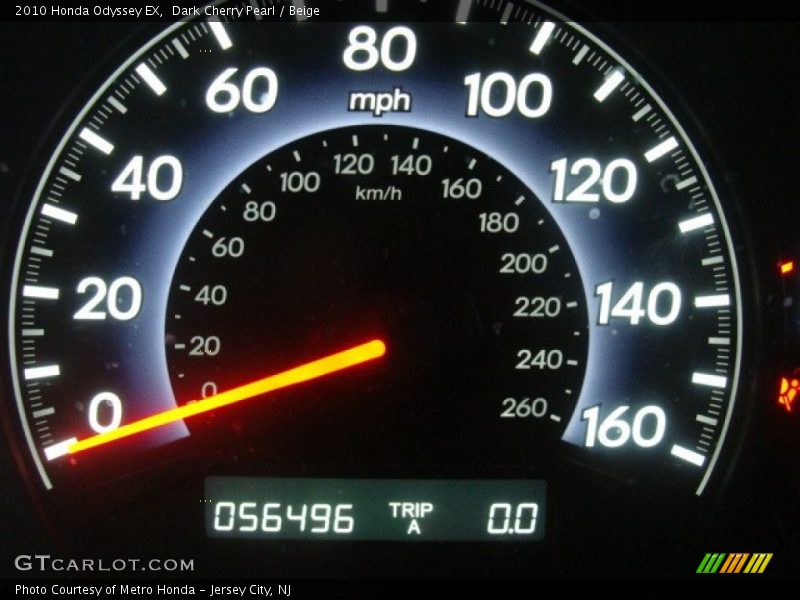 Dark Cherry Pearl / Beige 2010 Honda Odyssey EX