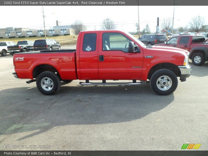 Red Clearcoat / Medium Flint 2002 Ford F250 Super Duty Lariat SuperCab 4x4