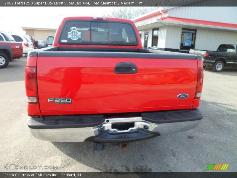 Red Clearcoat / Medium Flint 2002 Ford F250 Super Duty Lariat SuperCab 4x4