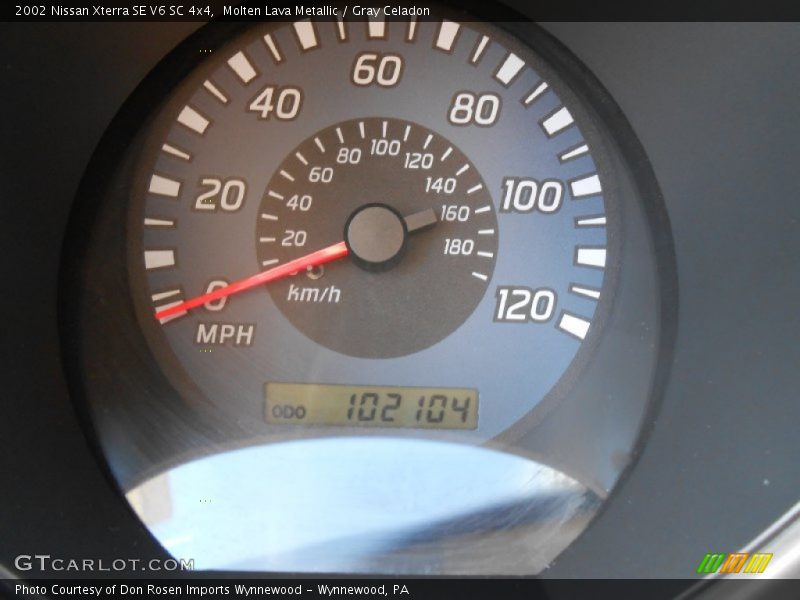 Molten Lava Metallic / Gray Celadon 2002 Nissan Xterra SE V6 SC 4x4
