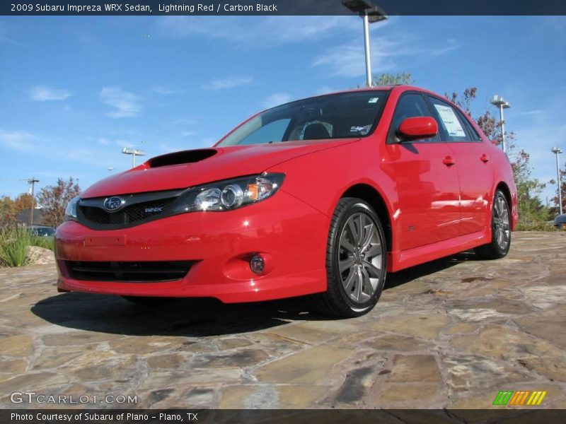 Lightning Red / Carbon Black 2009 Subaru Impreza WRX Sedan