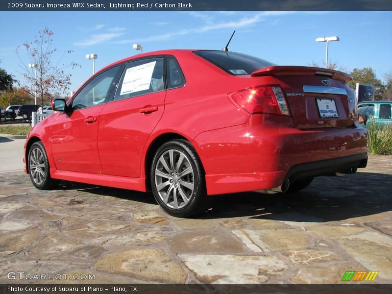 Lightning Red / Carbon Black 2009 Subaru Impreza WRX Sedan