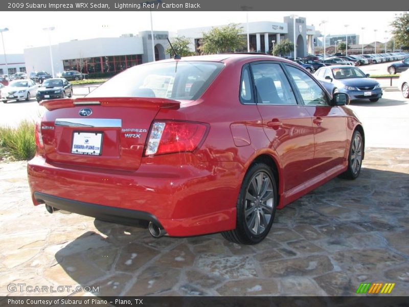 Lightning Red / Carbon Black 2009 Subaru Impreza WRX Sedan