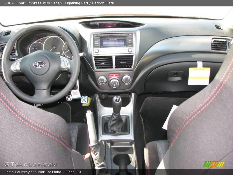 Lightning Red / Carbon Black 2009 Subaru Impreza WRX Sedan
