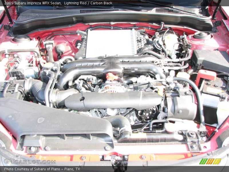 Lightning Red / Carbon Black 2009 Subaru Impreza WRX Sedan