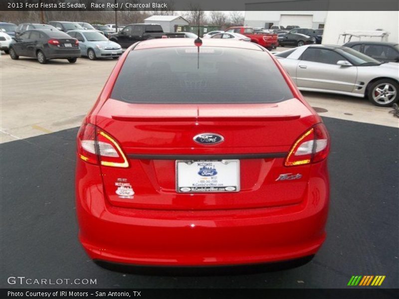Race Red / Charcoal Black 2013 Ford Fiesta SE Sedan