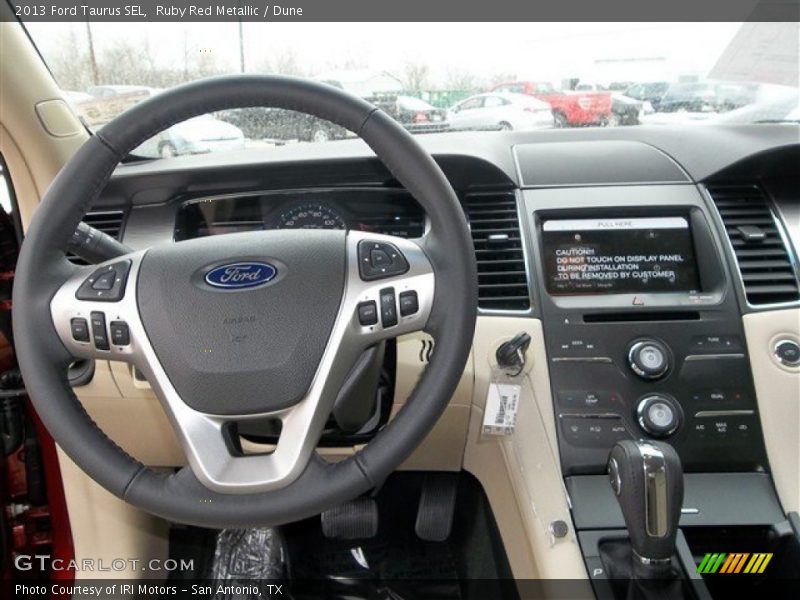 Ruby Red Metallic / Dune 2013 Ford Taurus SEL