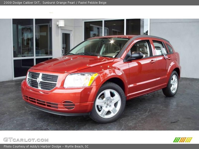 Sunburst Orange Pearl / Pastel Pebble Beige 2009 Dodge Caliber SXT