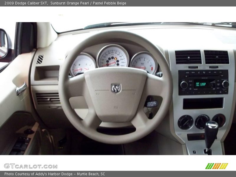 Sunburst Orange Pearl / Pastel Pebble Beige 2009 Dodge Caliber SXT