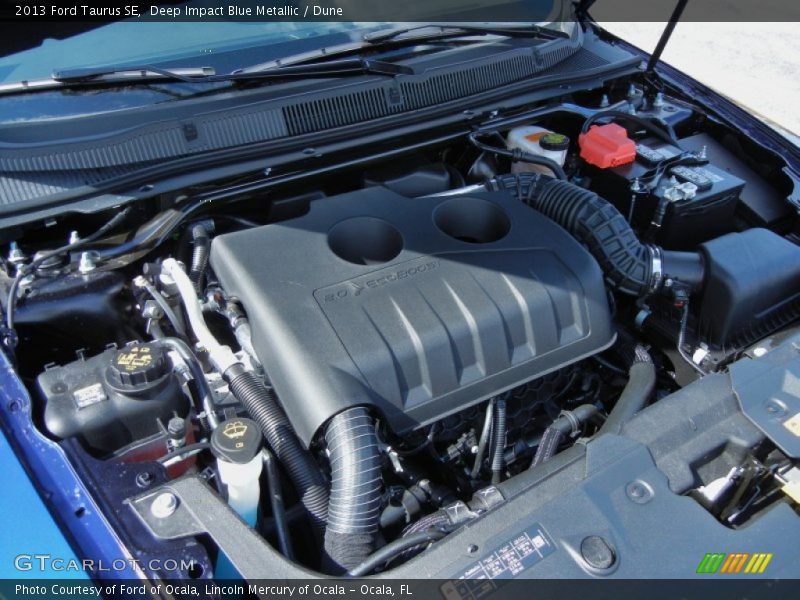 Deep Impact Blue Metallic / Dune 2013 Ford Taurus SE