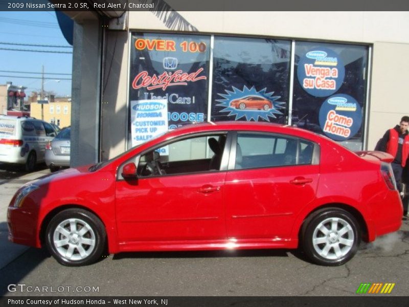 Red Alert / Charcoal 2009 Nissan Sentra 2.0 SR