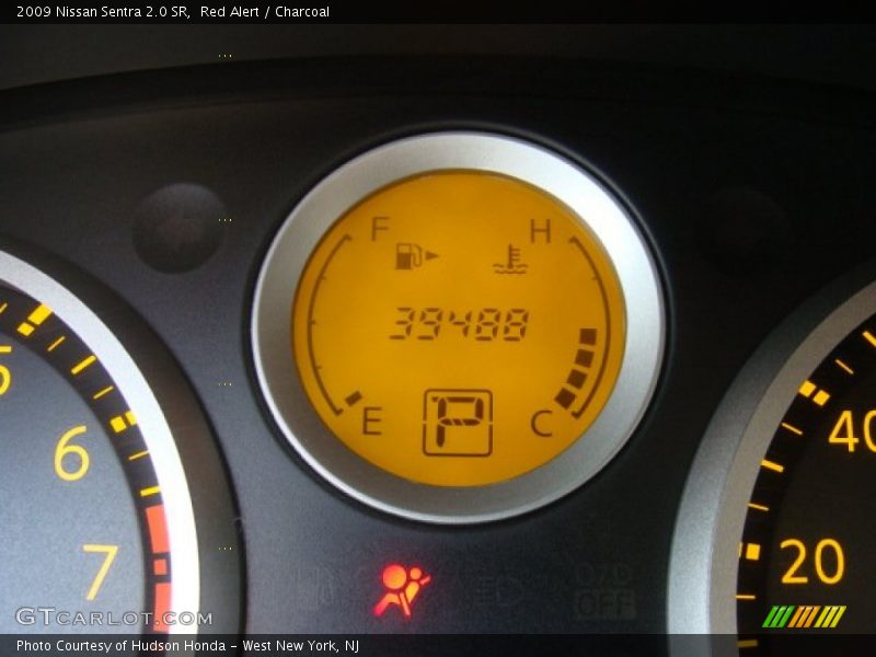 Red Alert / Charcoal 2009 Nissan Sentra 2.0 SR
