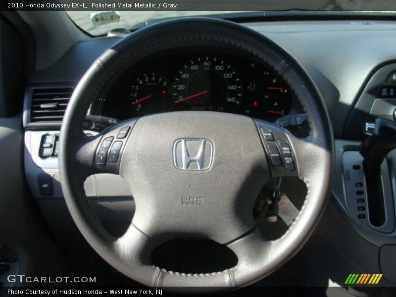 Polished Metal Metallic / Gray 2010 Honda Odyssey EX-L