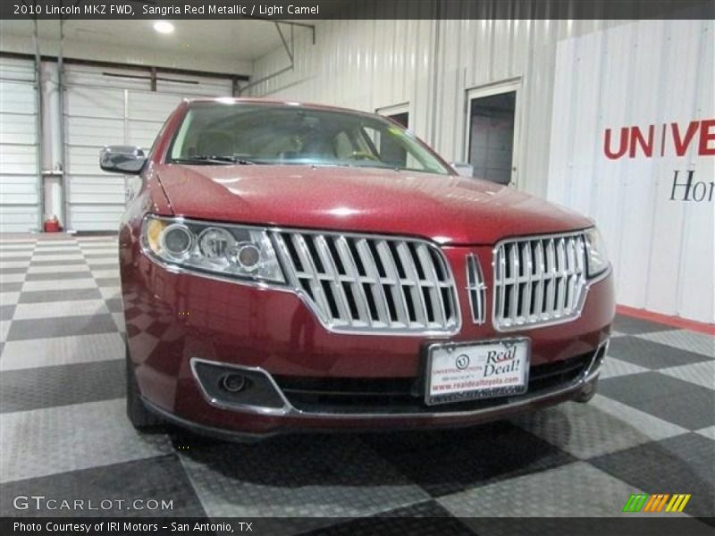 Sangria Red Metallic / Light Camel 2010 Lincoln MKZ FWD