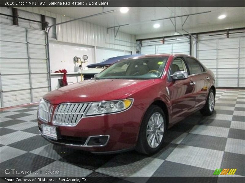 Sangria Red Metallic / Light Camel 2010 Lincoln MKZ FWD
