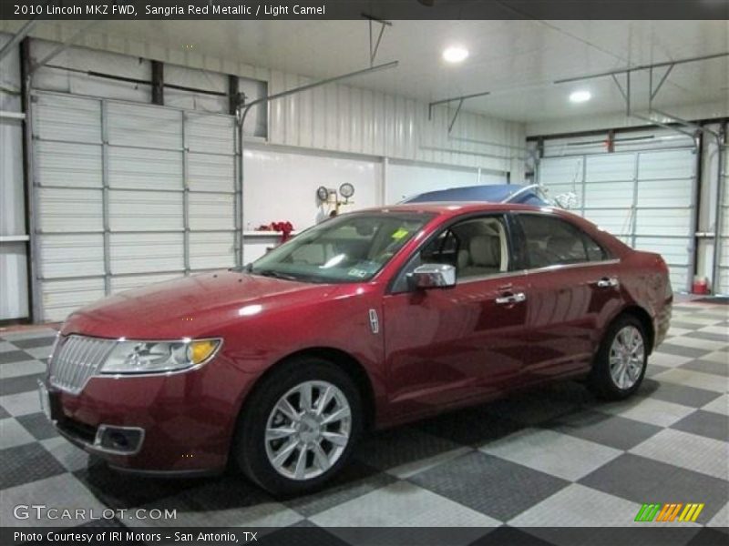 Sangria Red Metallic / Light Camel 2010 Lincoln MKZ FWD