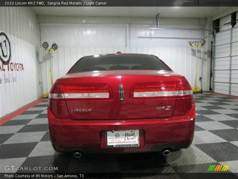 Sangria Red Metallic / Light Camel 2010 Lincoln MKZ FWD